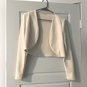 Women’s cream colored cropped blazer